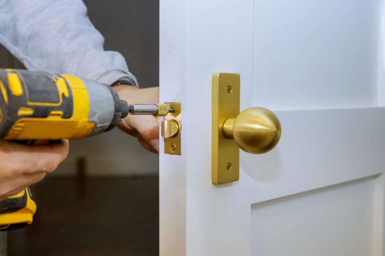 man drilling locks commercial locksmith services in miami, fl – rapid and knowledgeable locksmith services for your office and business